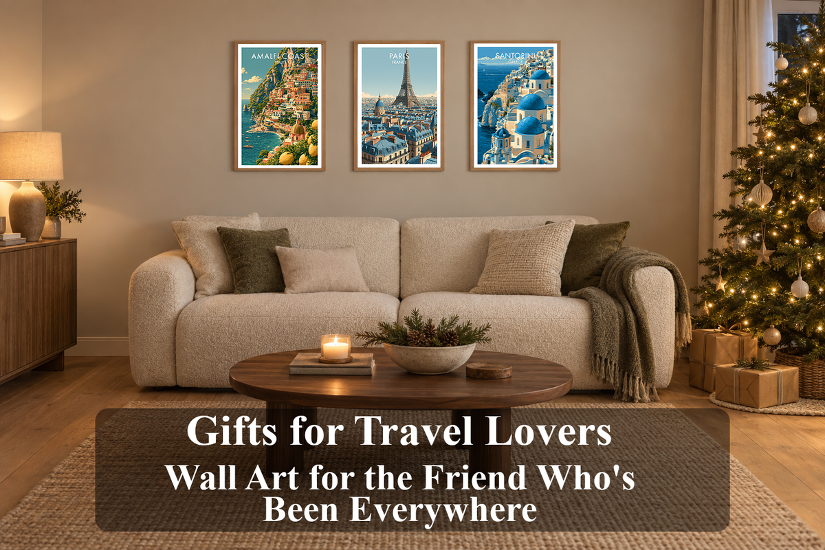Gifts for travel lovers: Positano, Paris and Santorini travel prints in oak frames above a cream sofa in a living room decorated for Christmas