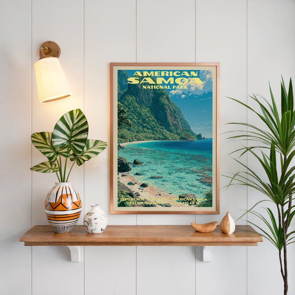 Ofu Beach American Samoa print framed on white panelling above an oak shelf with a patterned vase and sconce