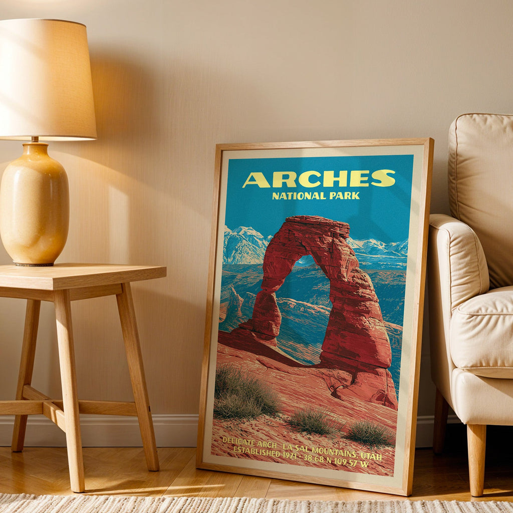 Delicate Arch Arches wall art in oak, leaning by an armchair and a side table with an ochre lamp