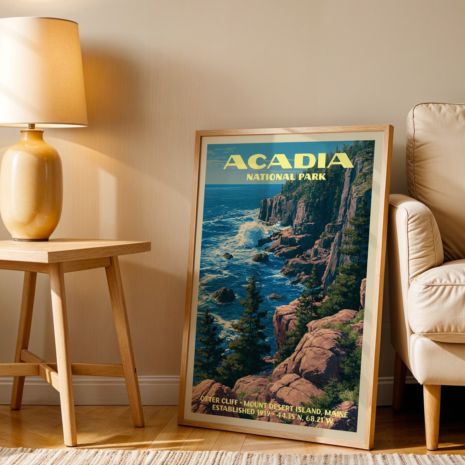 Otter Cliff Acadia wall art in oak, leaning by an armchair and a side table with an ochre lamp