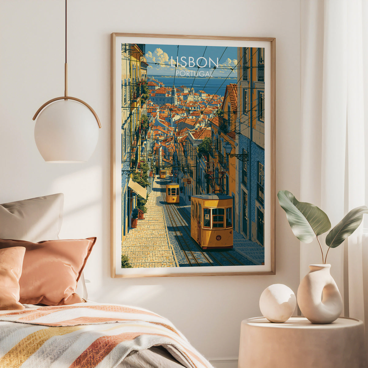 Alfama district wall art, large oak frame above a bed with rust bedding and a brass globe pendant
