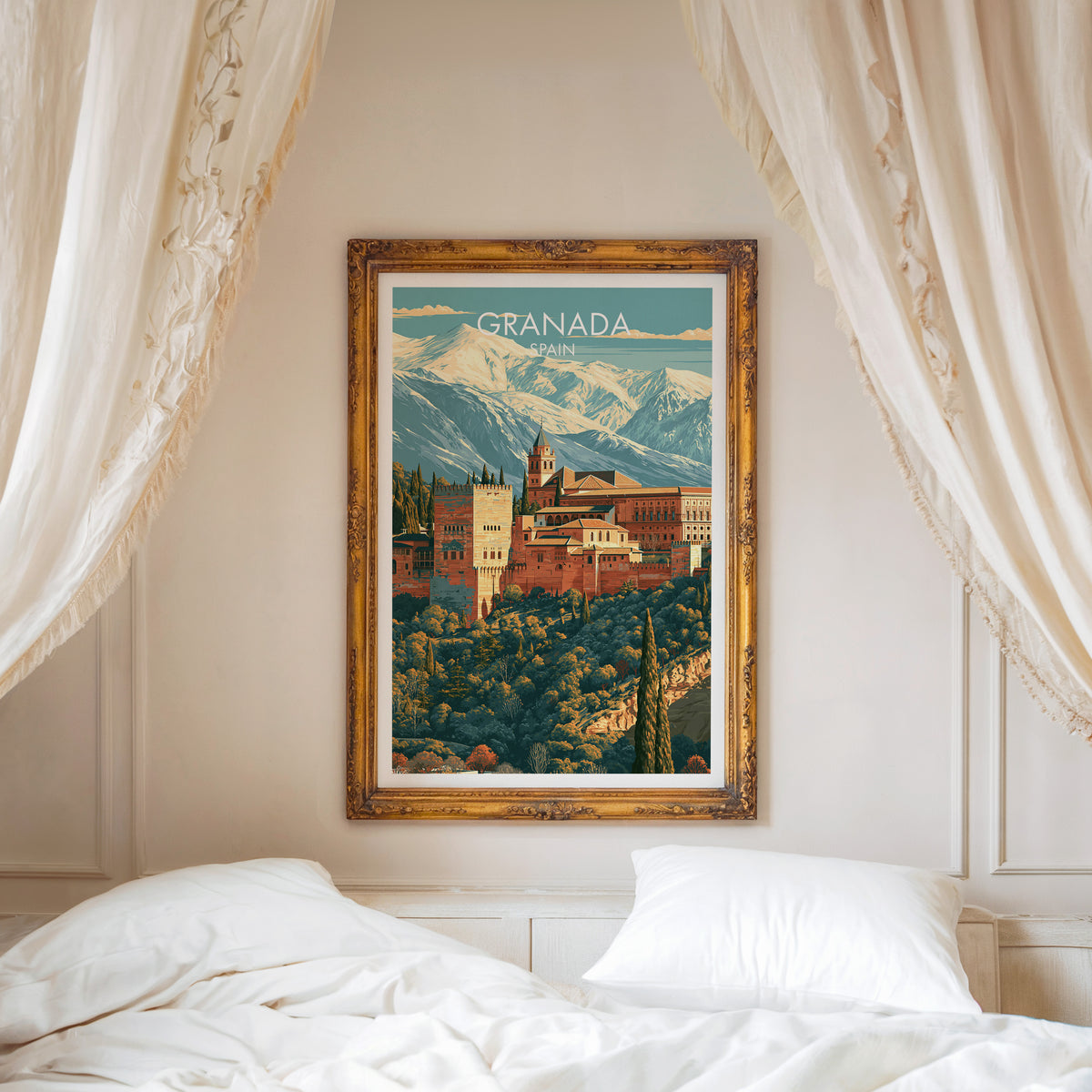 Alhambra Granada print in an ornate gold frame above a white bed with linen canopy curtains