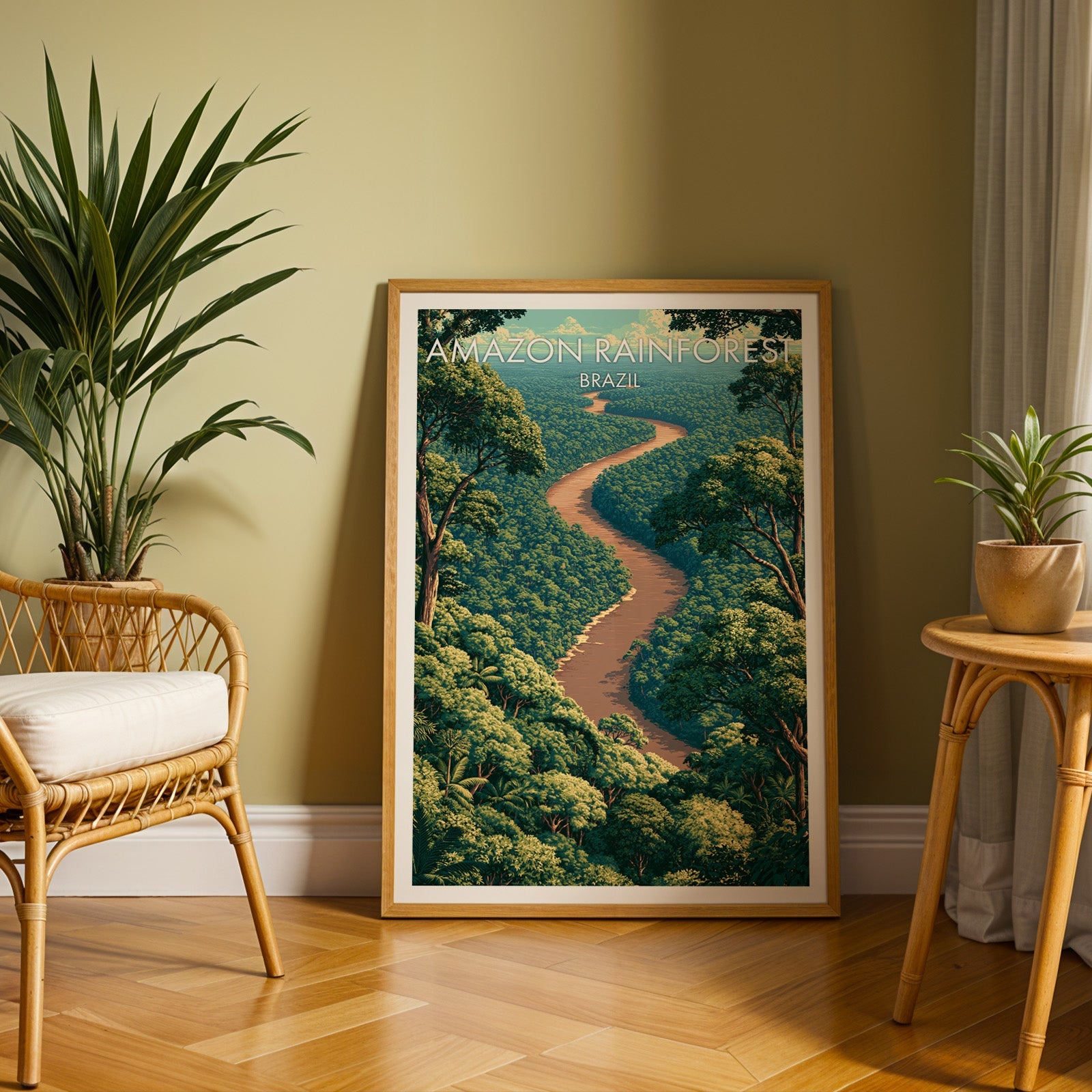 Amazon jungle travel print in an oak frame on herringbone floor by an olive wall, rattan chair and palm