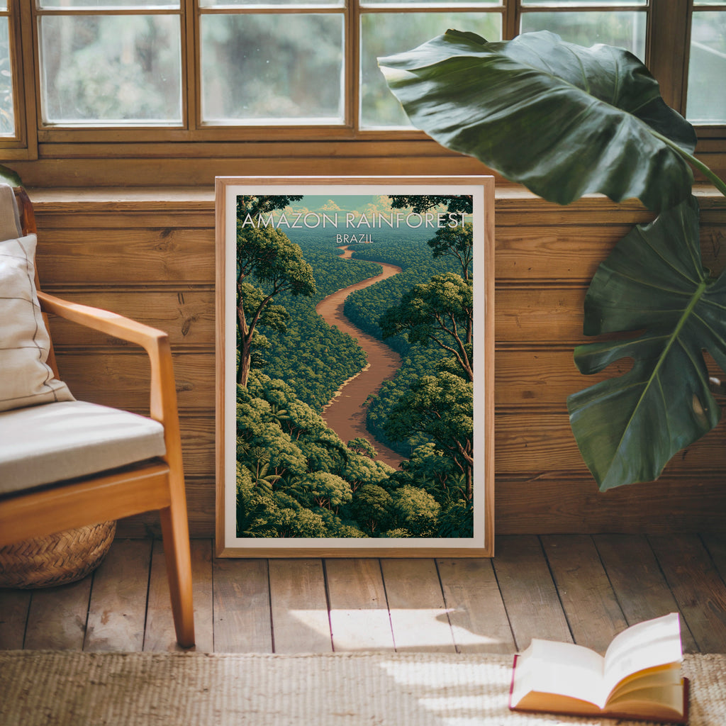 Brazilian rainforest print in an oak frame against pine cabin boards with a monstera leaf and open book