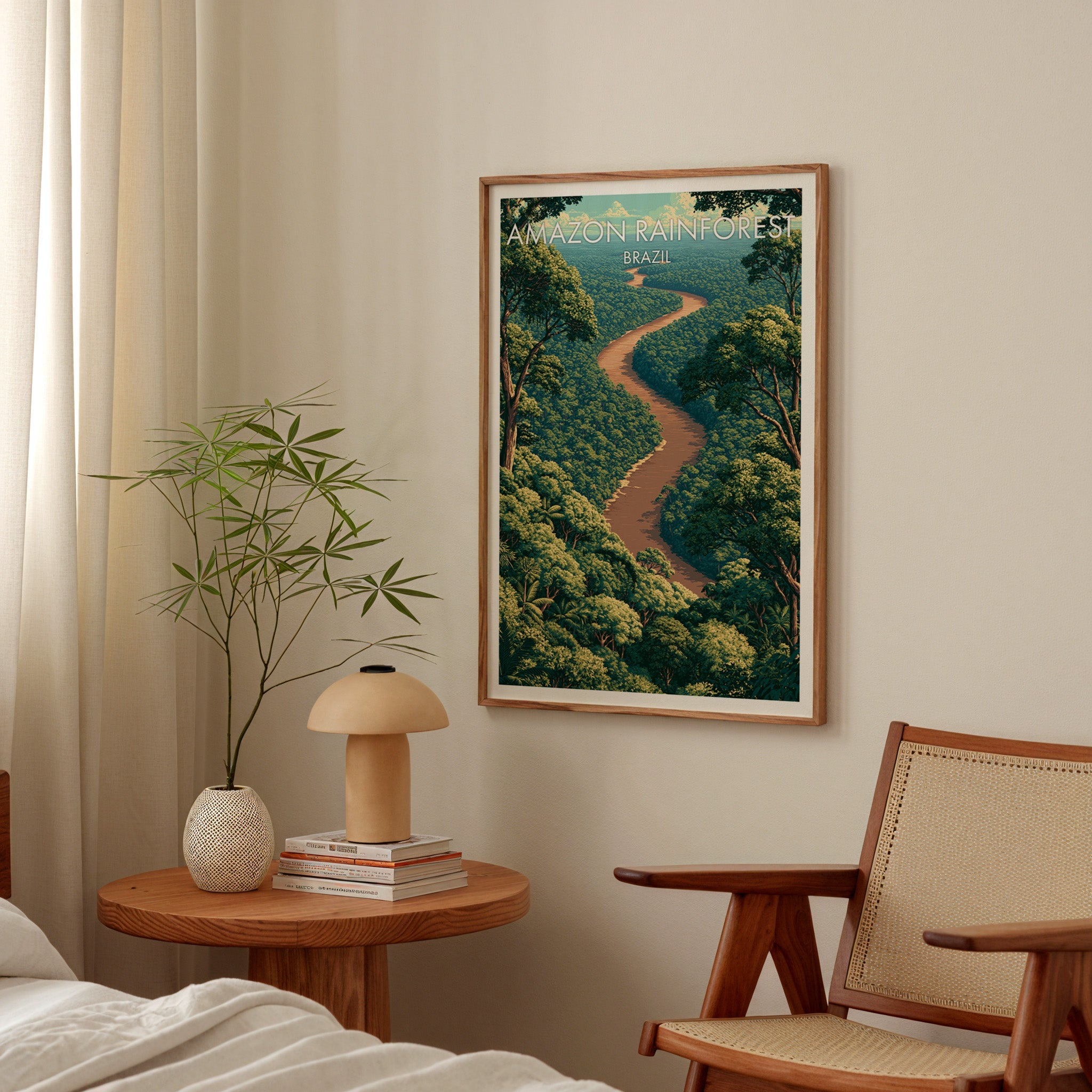 Green rainforest poster in a walnut frame in a bedroom above a round nightstand with a mushroom lamp