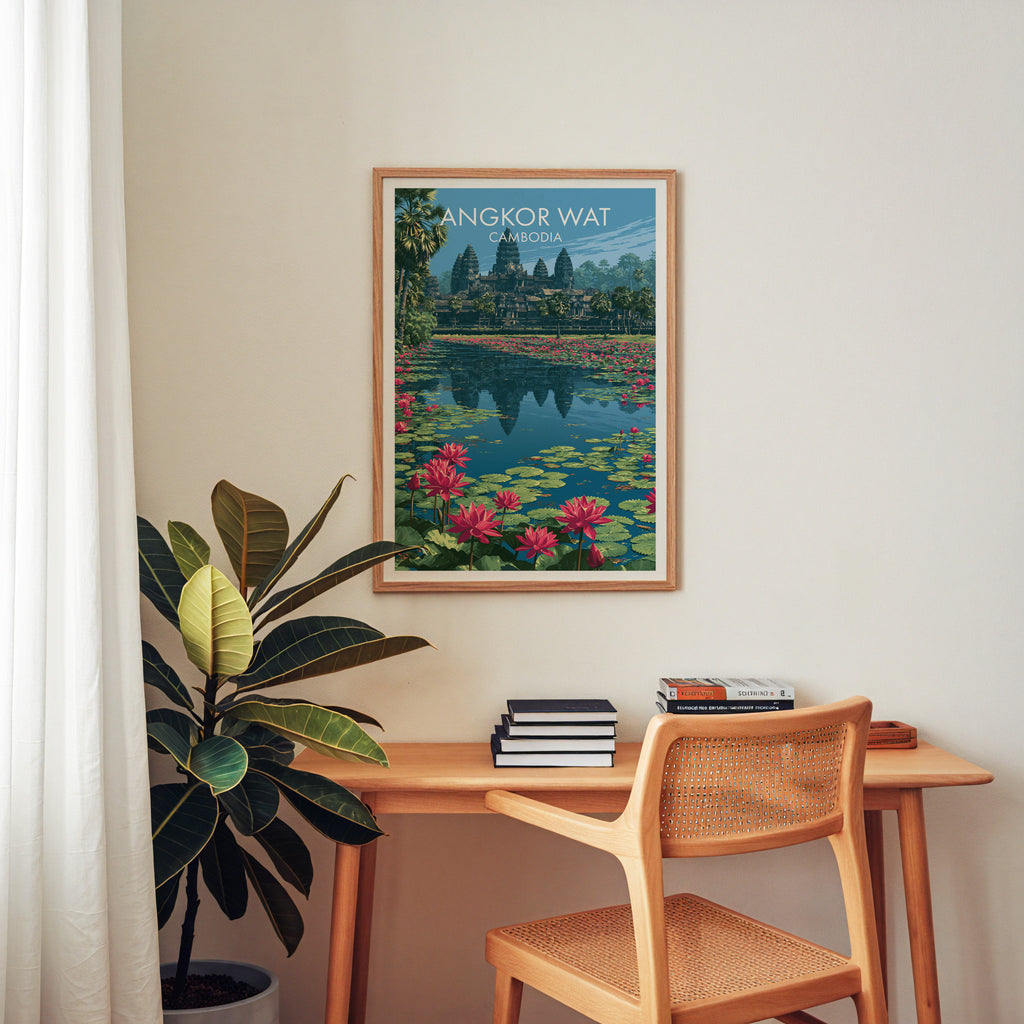 Angkor Wat Cambodia wall art above a wooden home office desk with a rattan chair and books