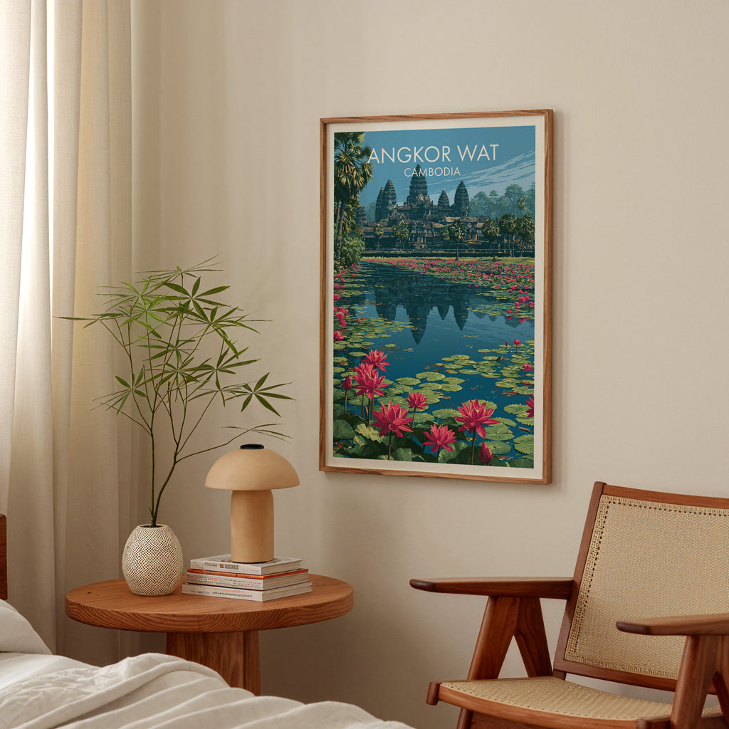 Angkor Wat Cambodia poster above a bedroom nightstand with a bamboo plant and mushroom lamp
