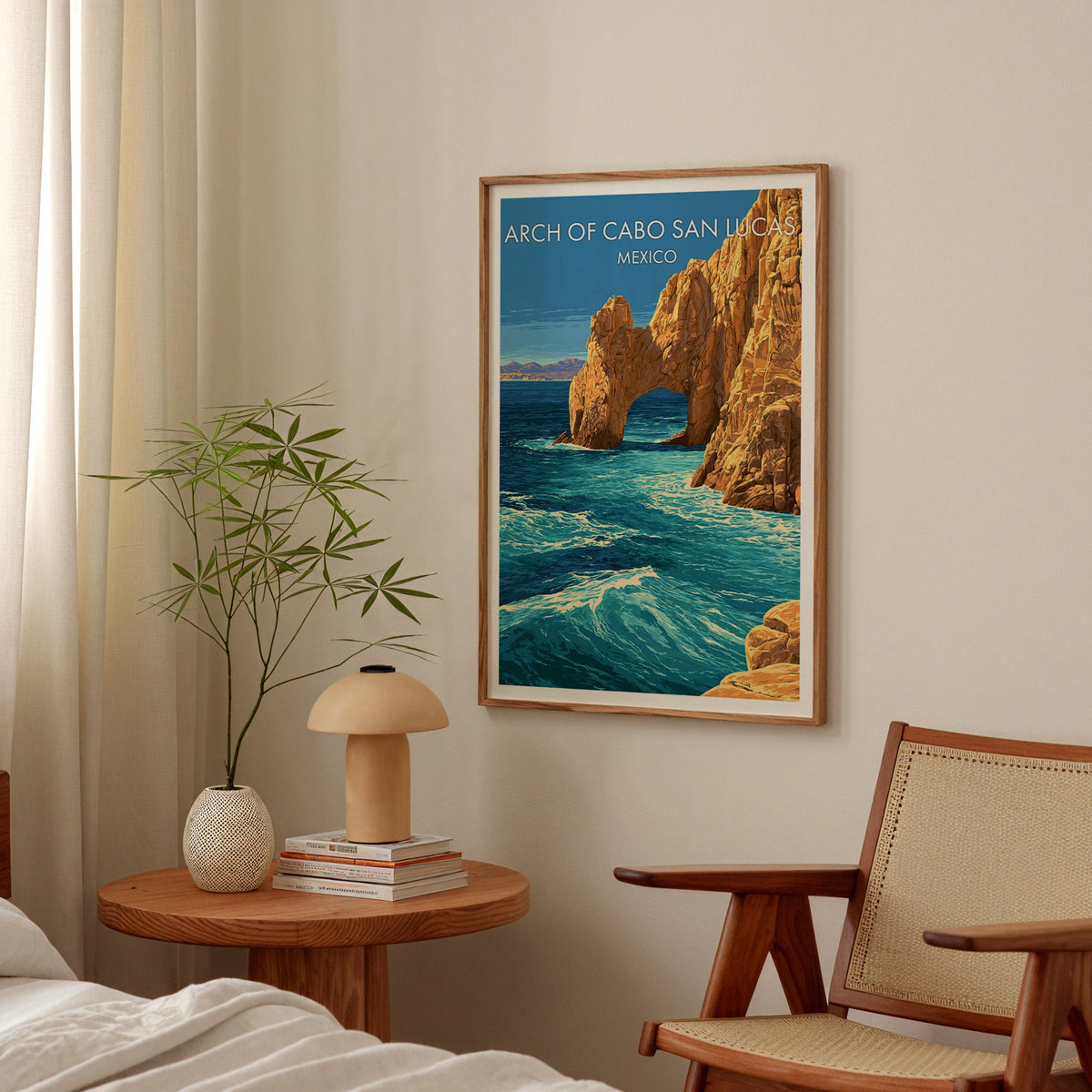 Foam and ochre stone in an oak frame above a round bedside table with a mushroom lamp and bamboo stems