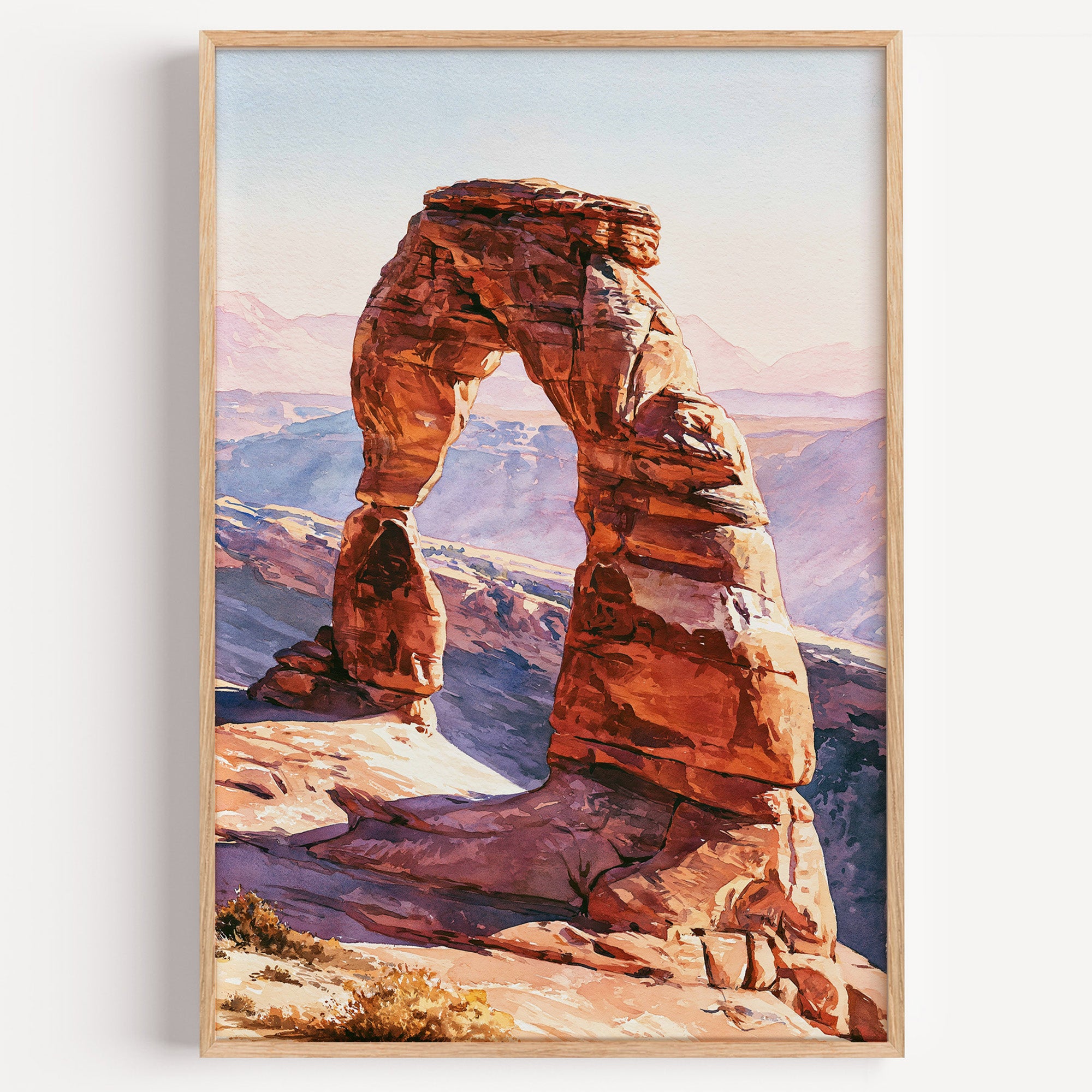 Arches National Park watercolor art print: Delicate Arch in red sandstone with hazy La Sal Mountains behind