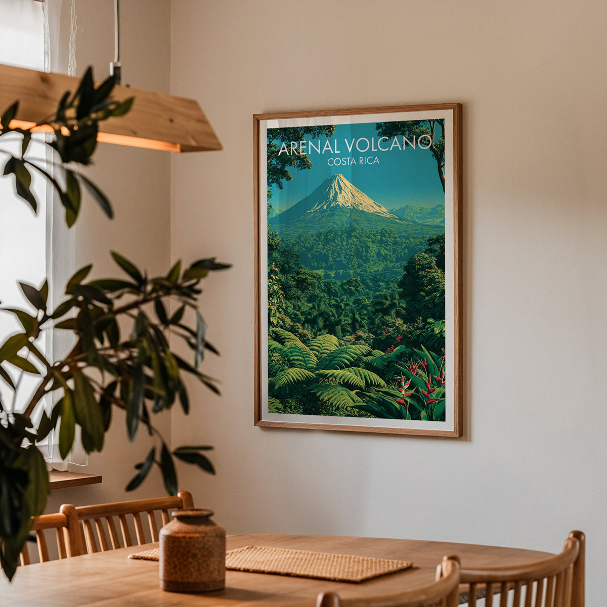 Teal sky over a volcano, oak frame in a dining corner with oak spindle chairs and a wood pendant lamp