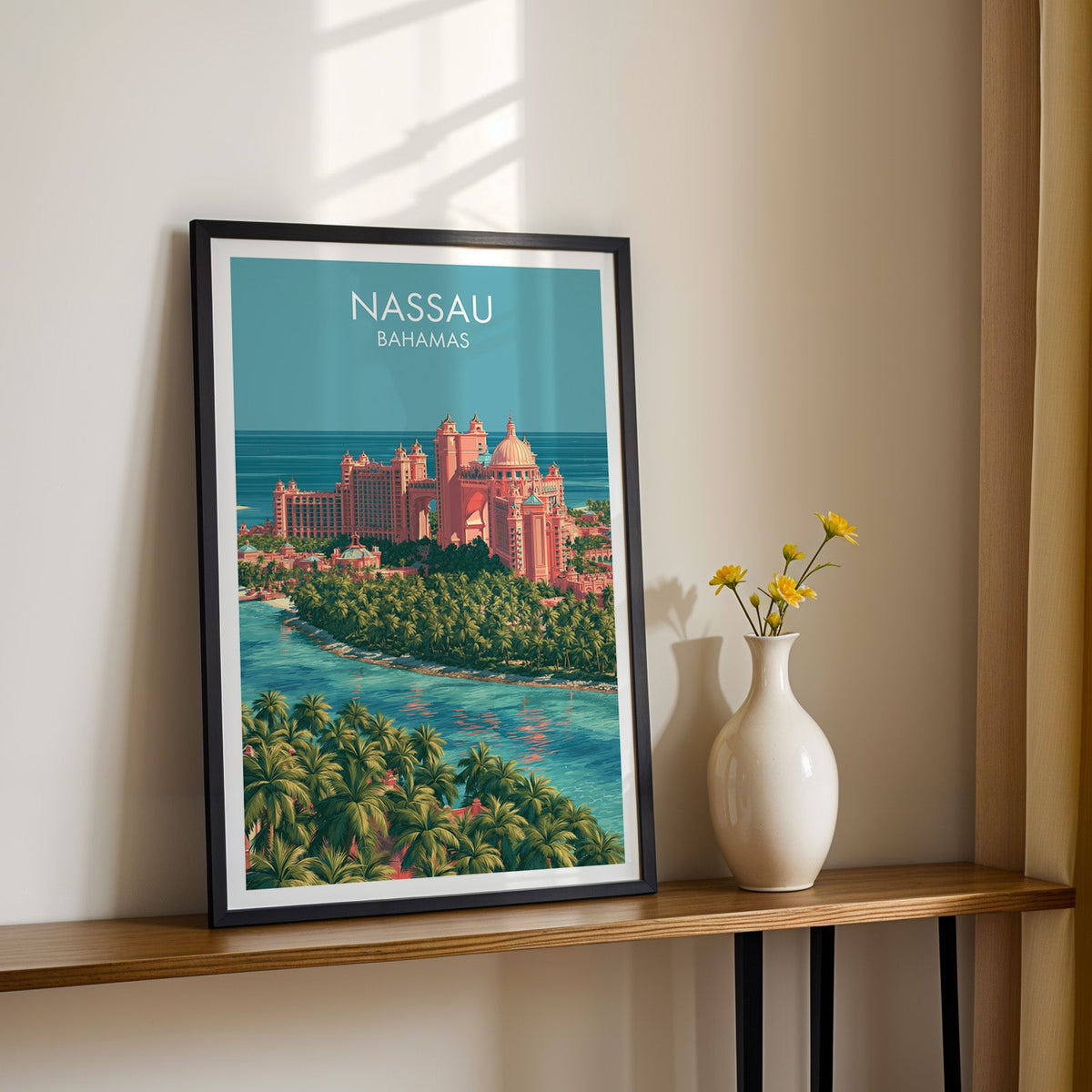 Coral rooflines over palm groves, black frame on a slim wood shelf with yellow daisies on a sunlit cream wall