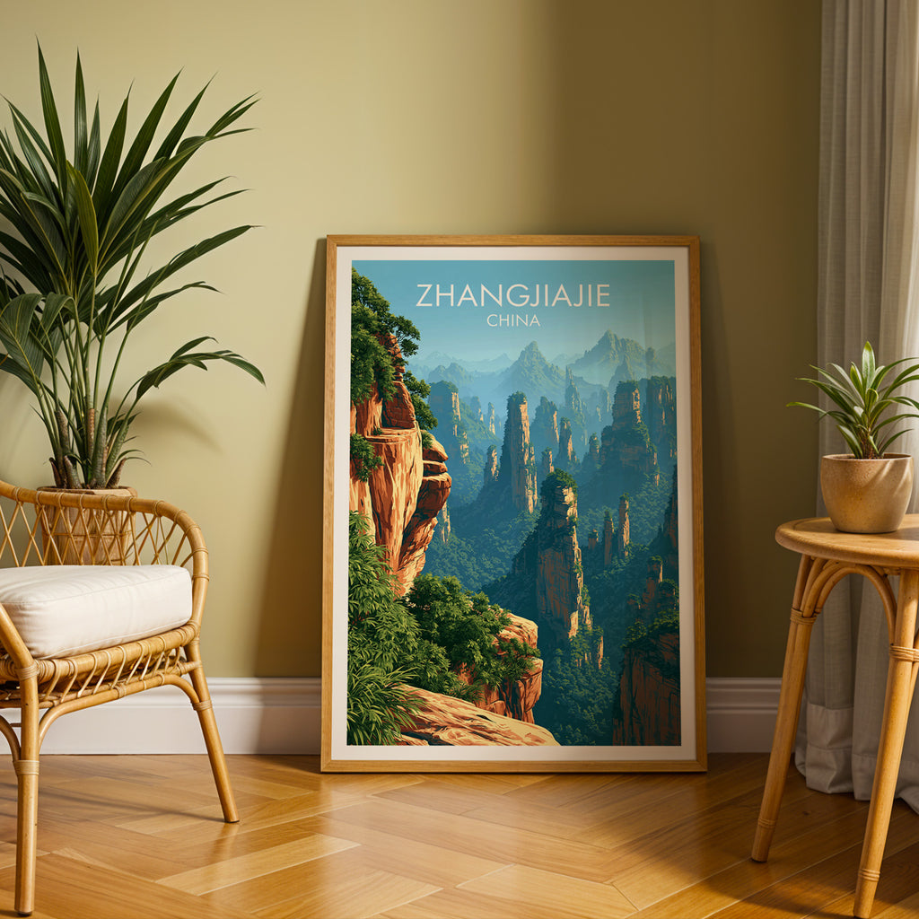 Large Zhangjiajie China travel print in an oak frame leaning on a herringbone floor next to a rattan chair