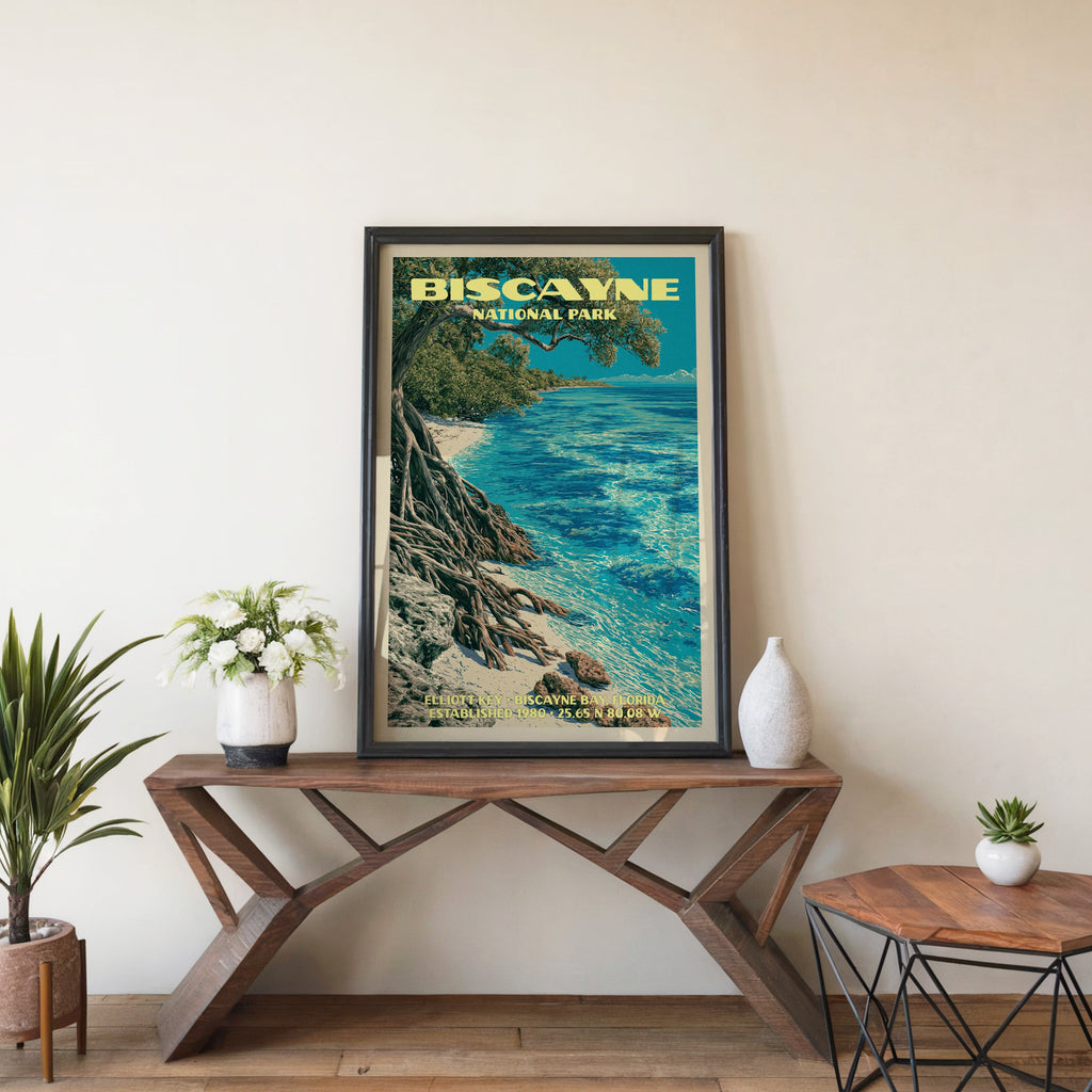 Biscayne Elliott Key wall art in black, leaning on a walnut console with white anemones and a white vase