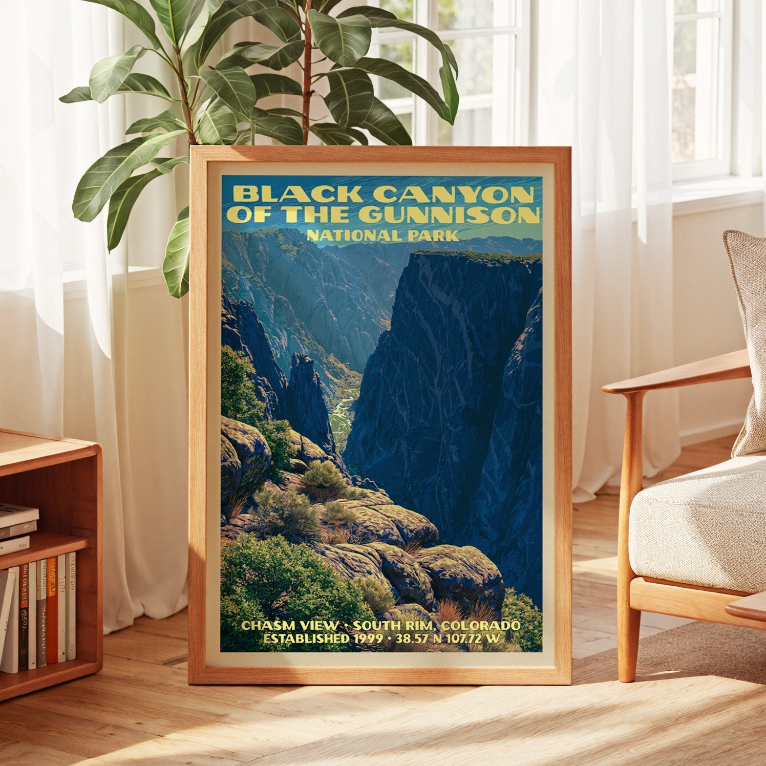 Black Canyon vintage poster in oak, leaning by a sunlit window with sheer curtains and a low bookshelf