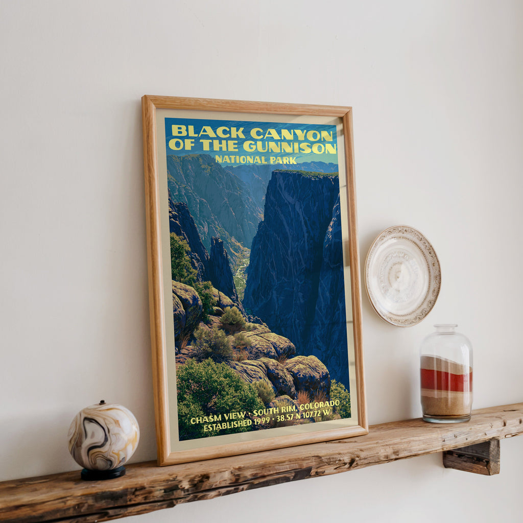 Black Canyon of the Gunnison print in oak on a reclaimed wood ledge with a stone sphere and sand jar
