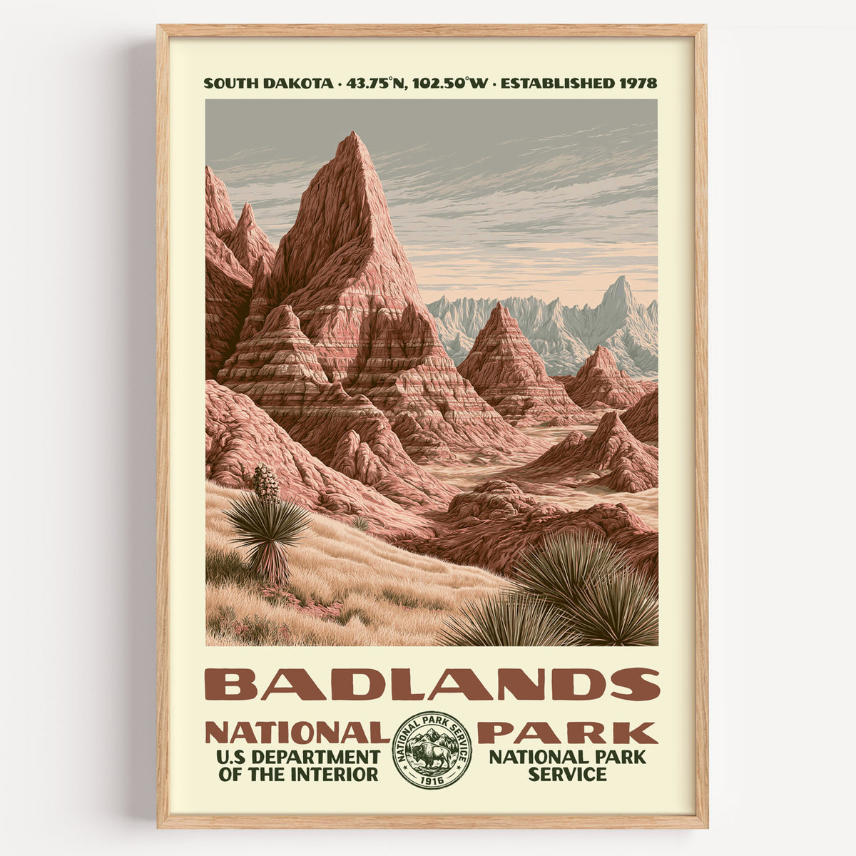 Badlands National Park vintage WPA poster in a wood frame, banded sandstone spires rising out of the prairie