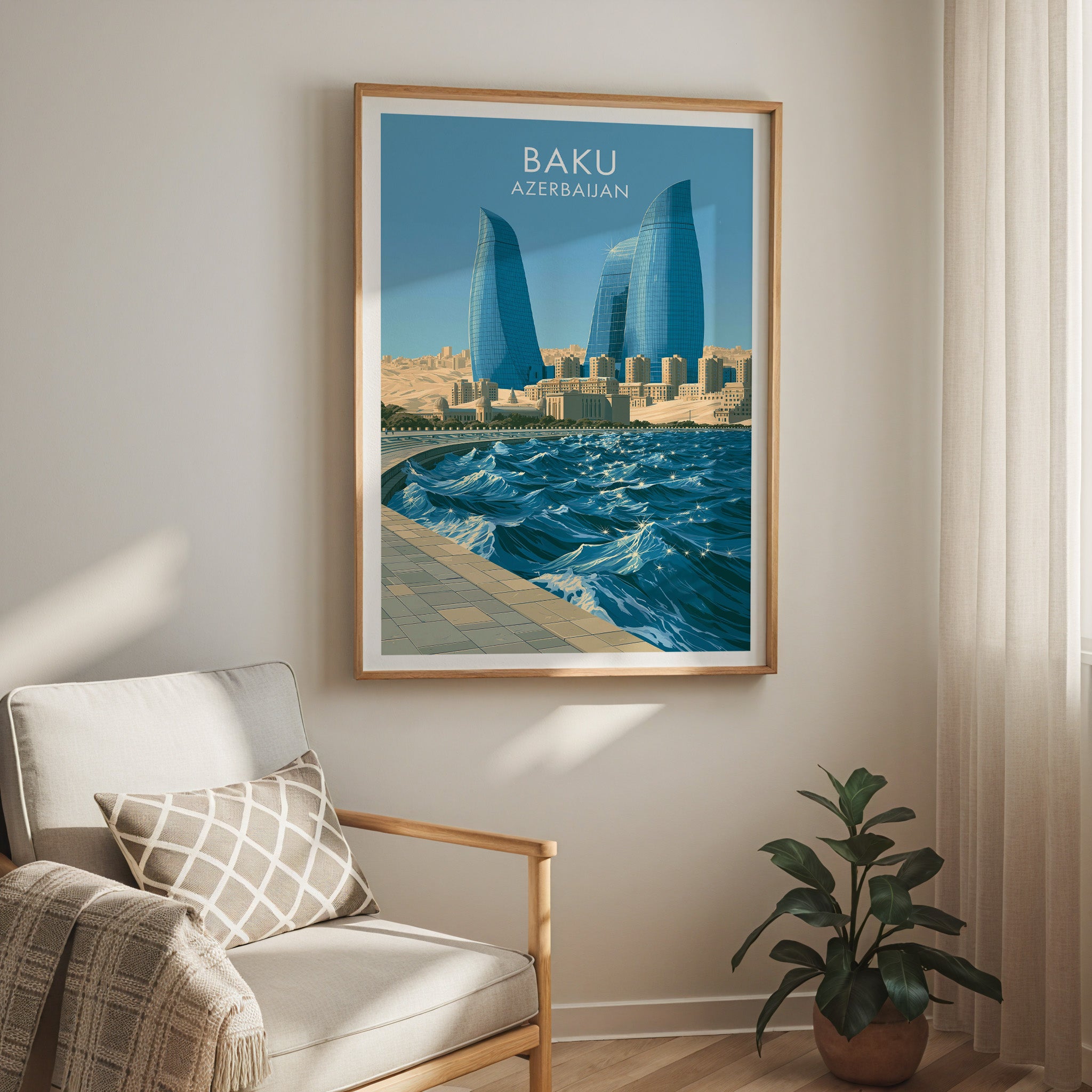 Baku Azerbaijan travel print in a light oak frame on a living room wall beside a linen armchair