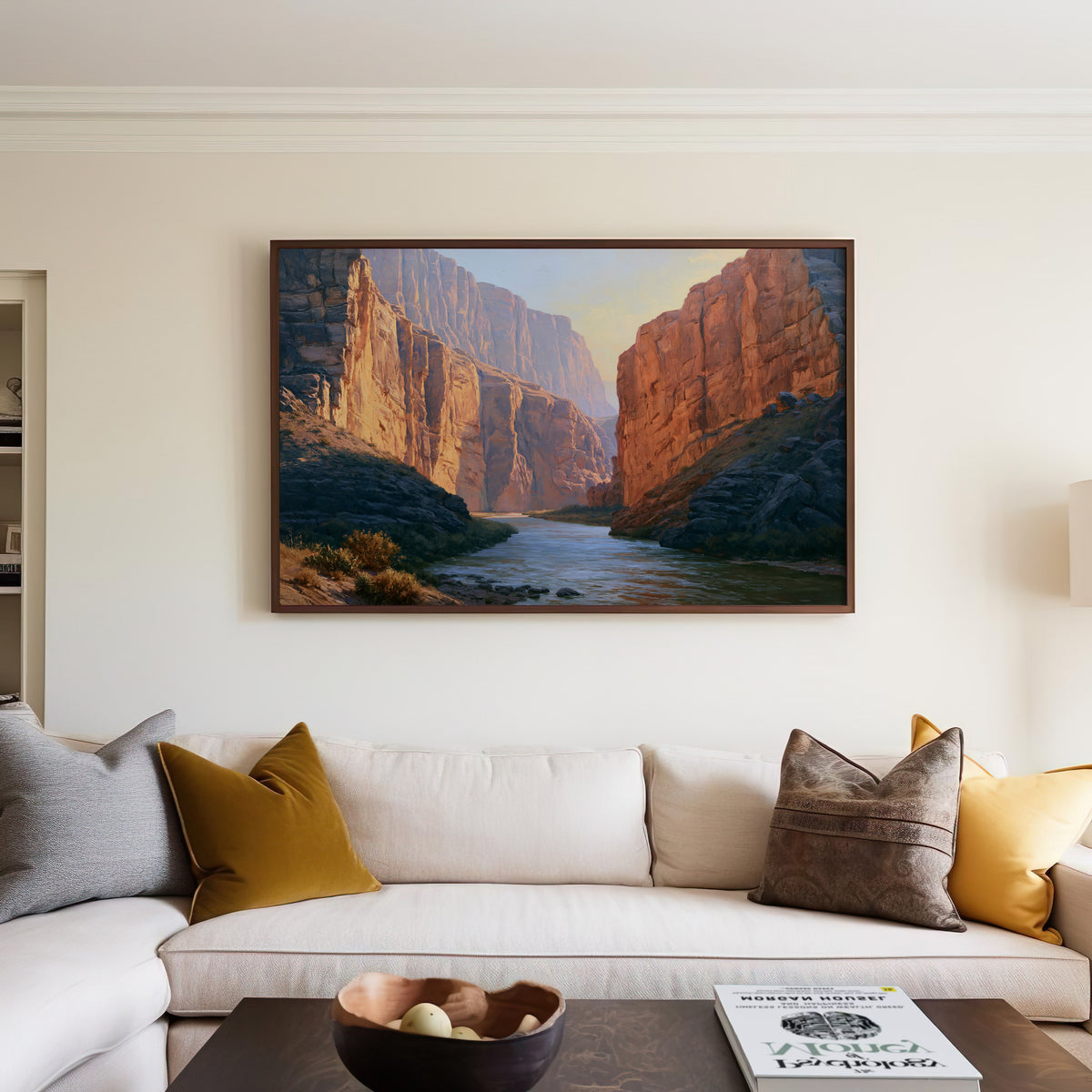 Big Bend classical oil painting canvas in a walnut frame above a cream sofa