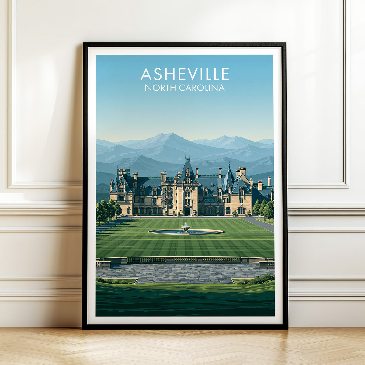 Biltmore Estate wall art in a black frame on white panelled moulding above a herringbone wood floor