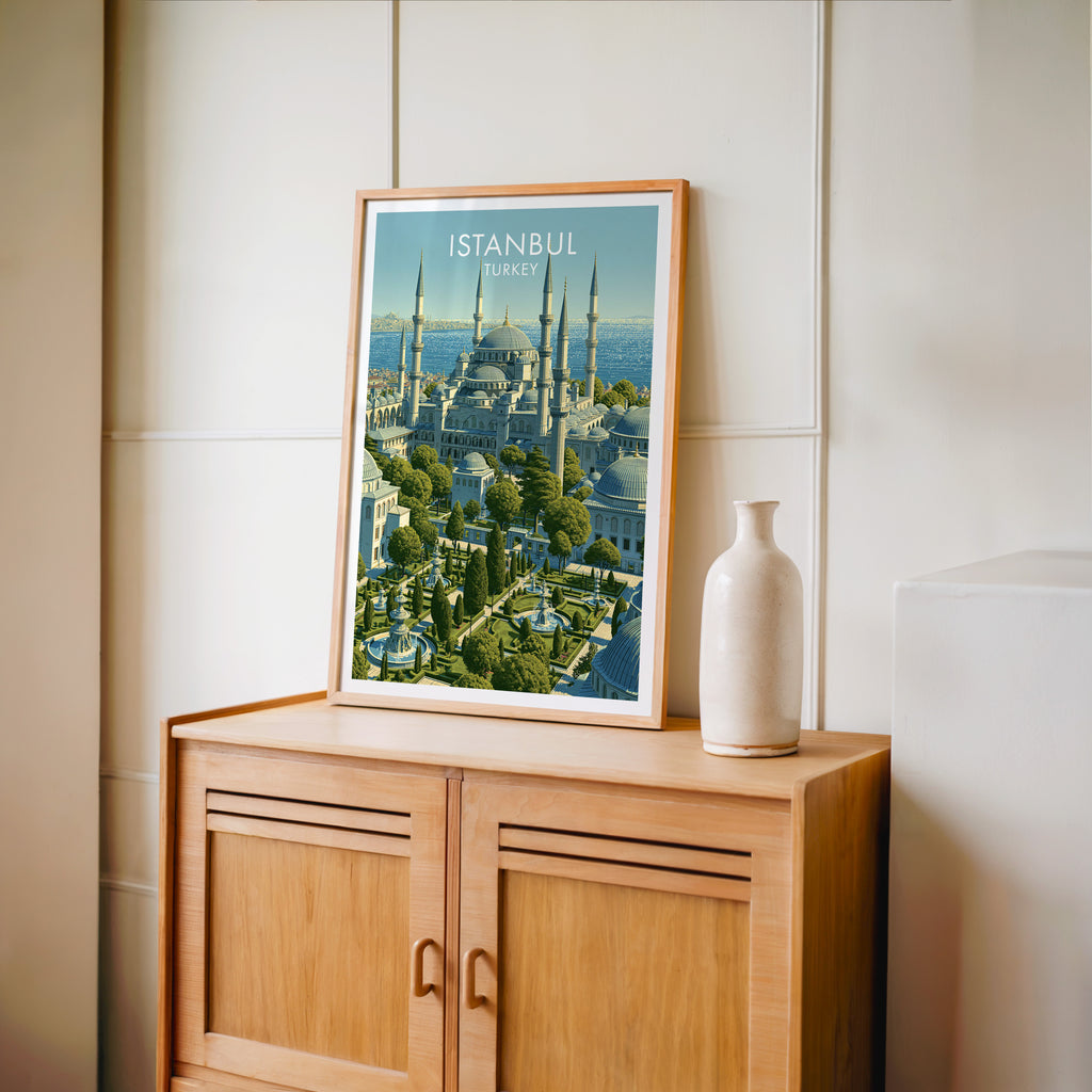 Small Blue Mosque Istanbul Turkey travel poster in an oak frame on a mid-century sideboard with a ceramic vase