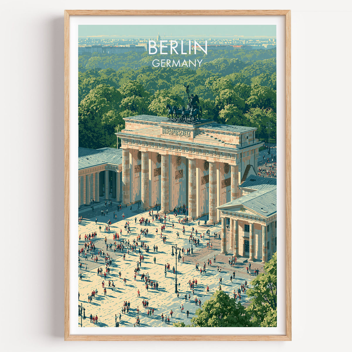 Brandenburg Gate travel poster, light oak frame on a plain white wall