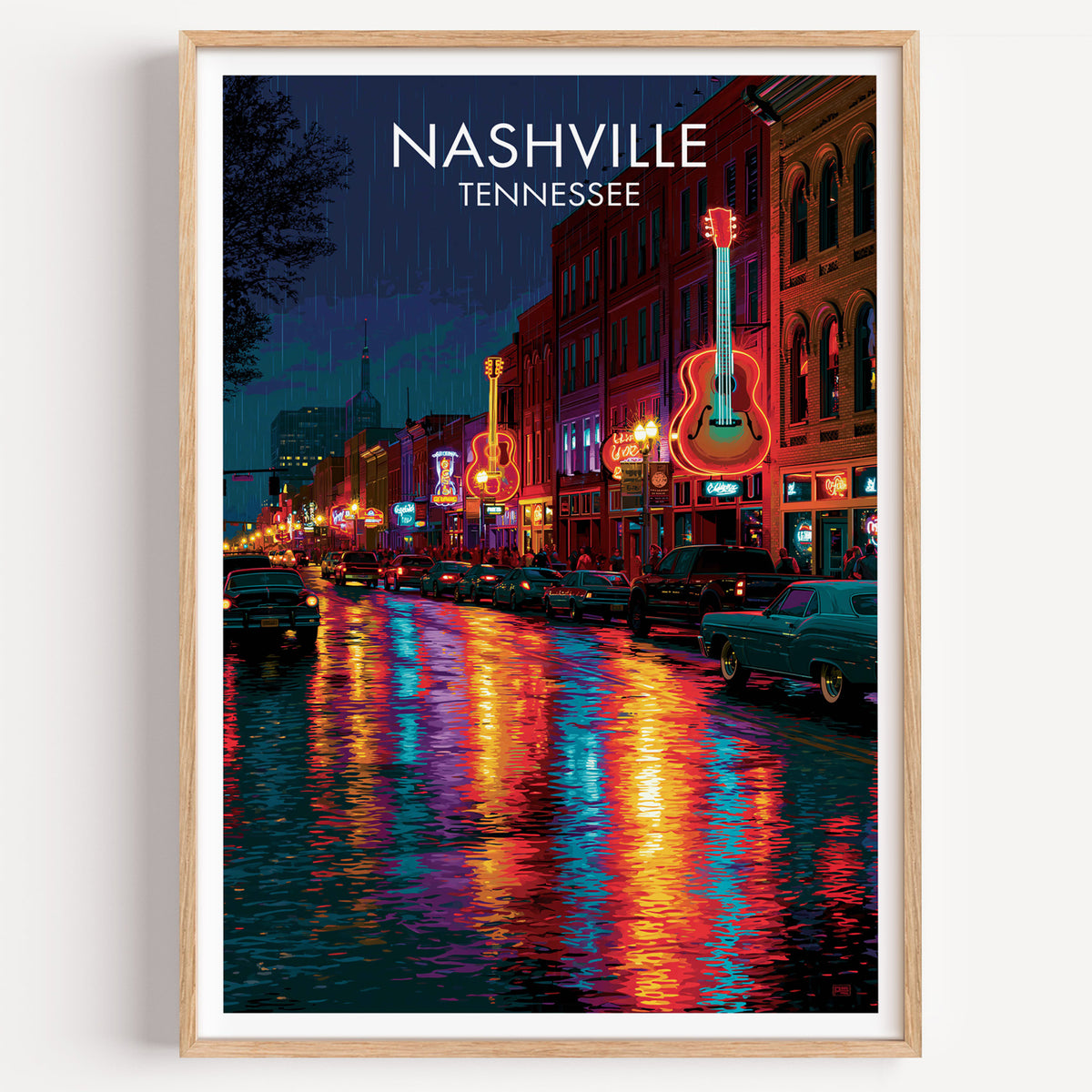 Broadway Nashville travel poster in a light oak frame on a plain white wall