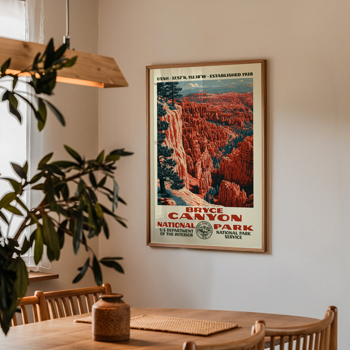 Bryce Canyon National Park vintage travel print hung above a wooden dining table under a pendant lamp
