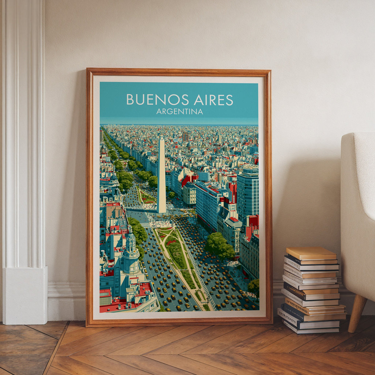 Buenos Aires rooftops print in a walnut frame on herringbone floor by white moulding and stacked books