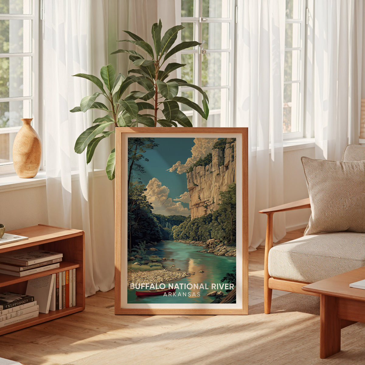 Buffalo National River travel print in oak by a sunlit window with a potted plant and low bookshelf