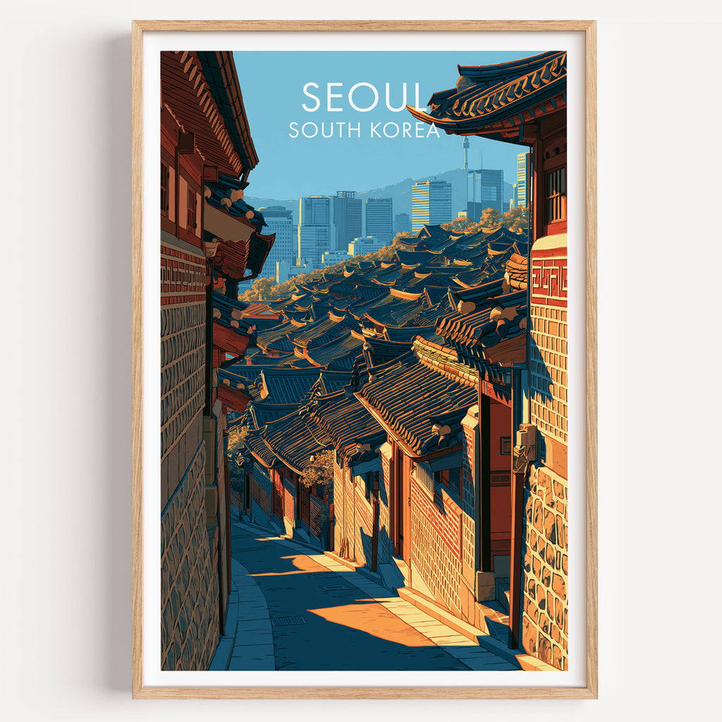 Bukchon Hanok Village Seoul travel poster in a natural wood frame, shown against a clean white wall