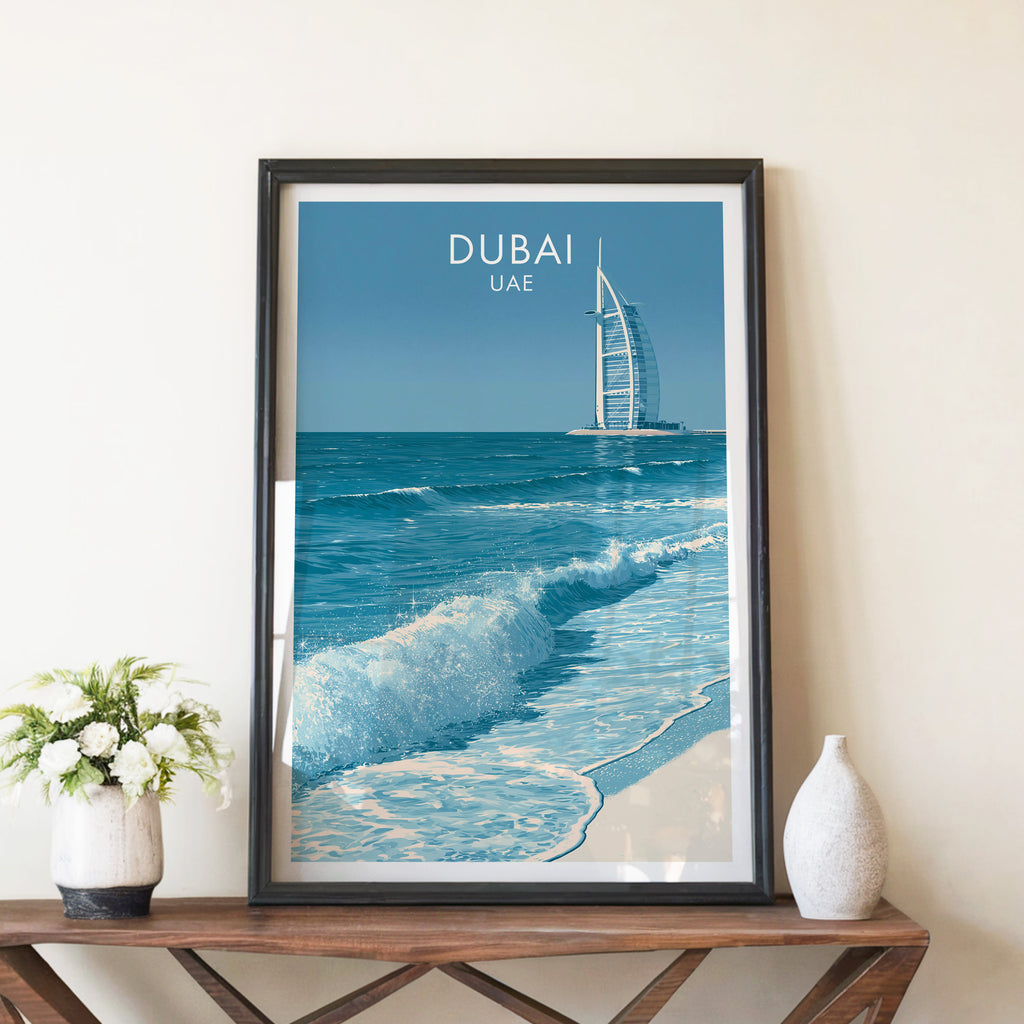 Burj Al Arab Dubai UAE travel poster in a black frame on a wooden console table with white flowers
