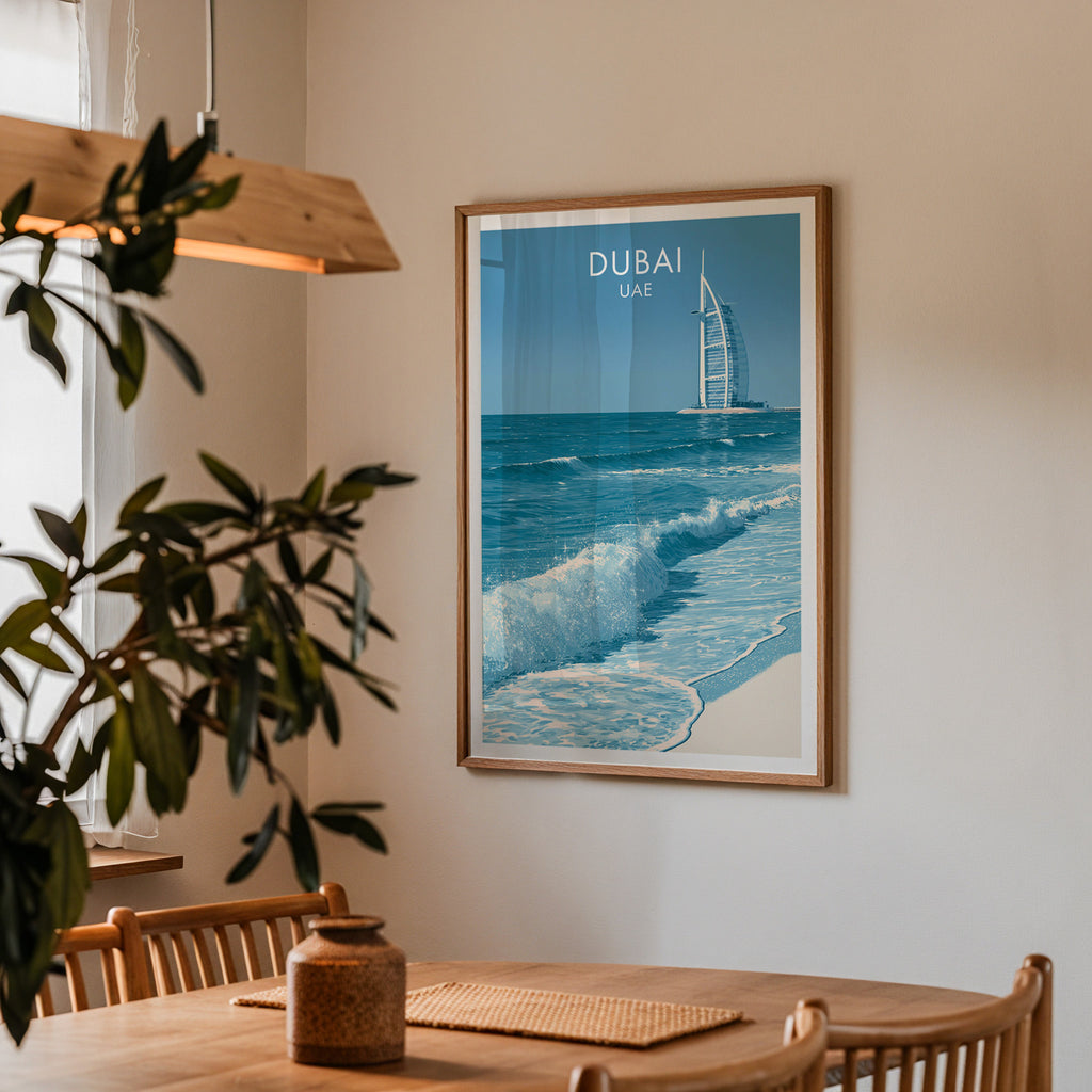 Framed Burj Al Arab Dubai UAE print on a dining room wall above an oak table in warm afternoon light