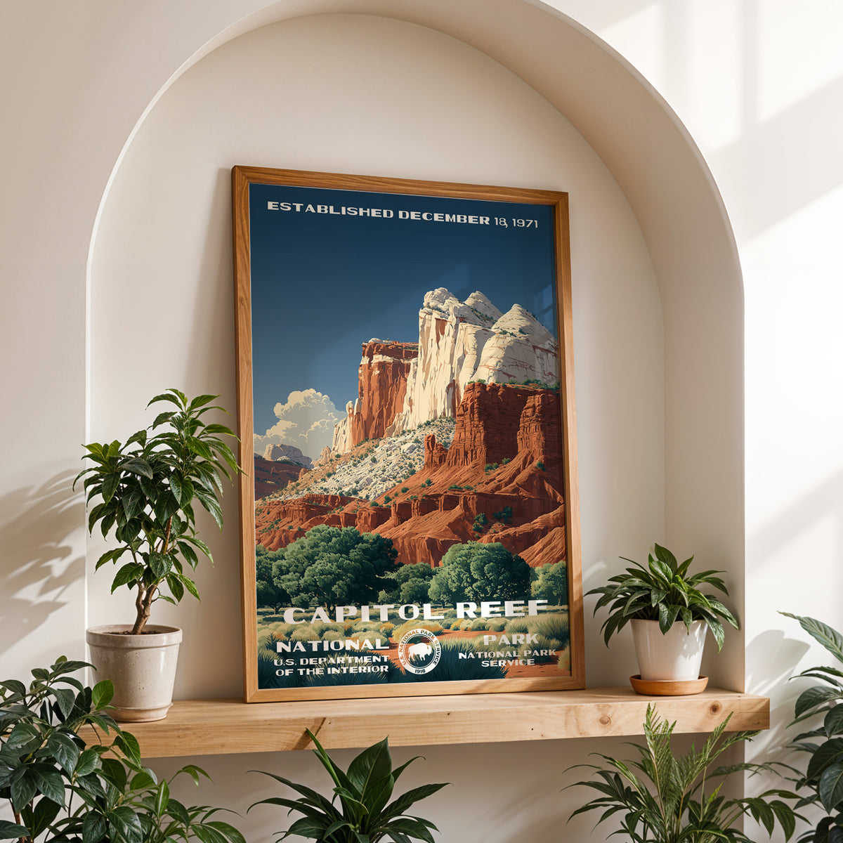 Capitol Reef National Park retro travel print framed on a wooden shelf in a sunlit arched alcove