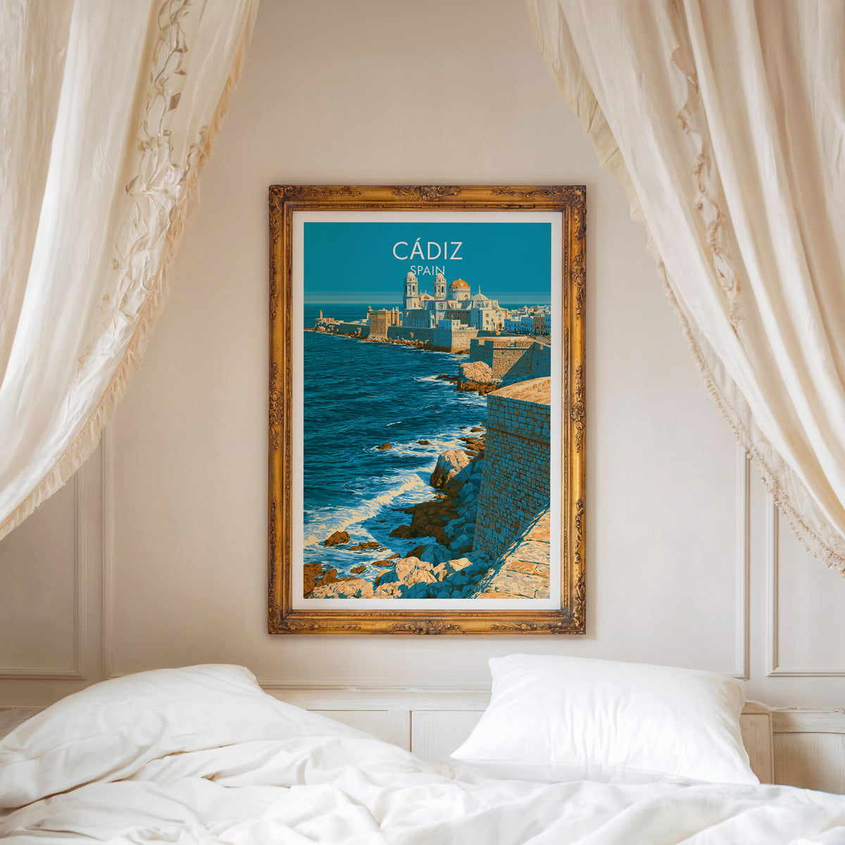 Cádiz travel poster, ornate gold frame above a white bed with linen canopy curtains