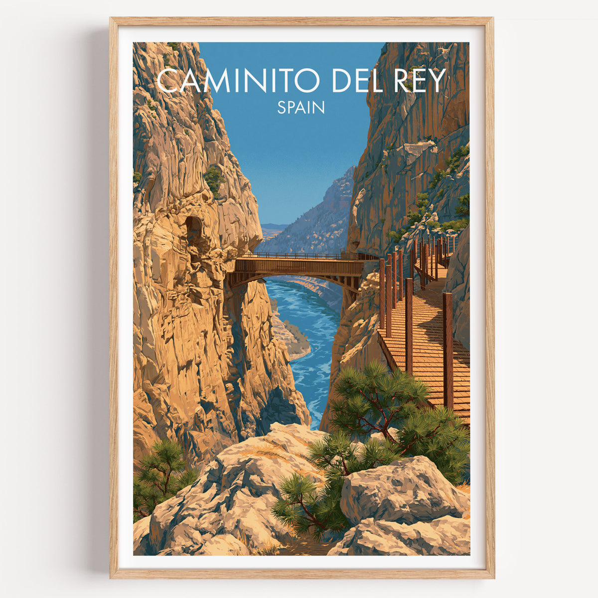 Caminito del Rey poster, light oak frame on a plain white wall