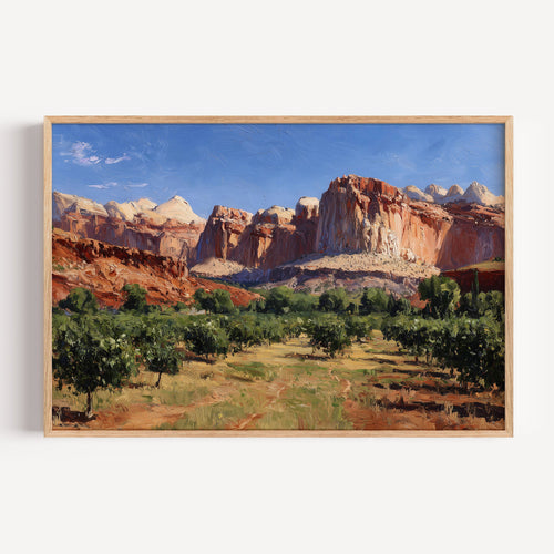 Capitol Reef National Park oil painting print in a light oak frame: red sandstone cliffs above an orchard