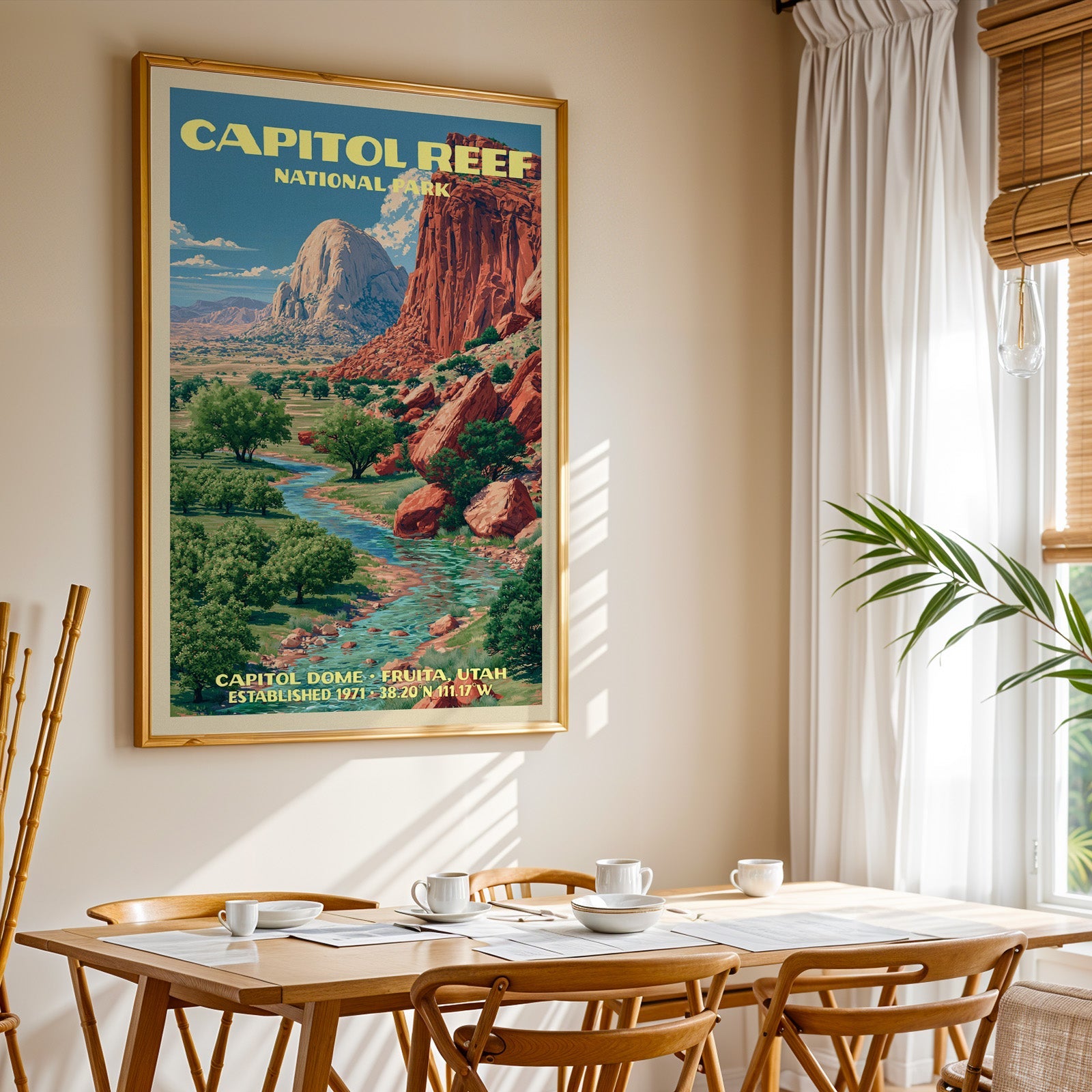 Capitol Reef National Park print in gold above a light oak dining table by a curtained window