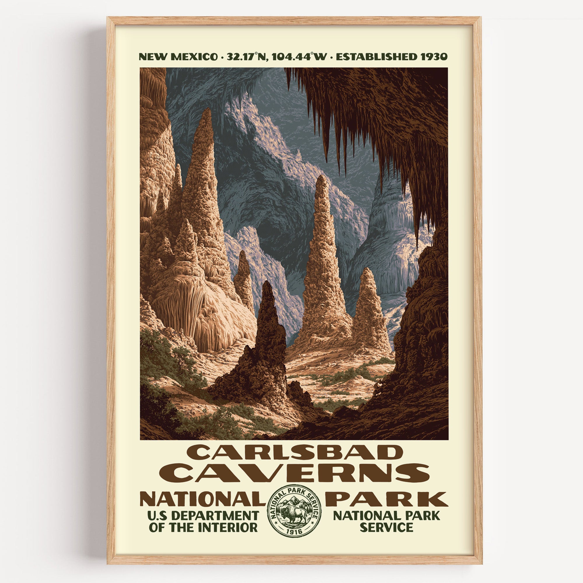 Carlsbad Caverns National Park vintage WPA poster in a wood frame, cathedral-scale stalagmites lit deep underground