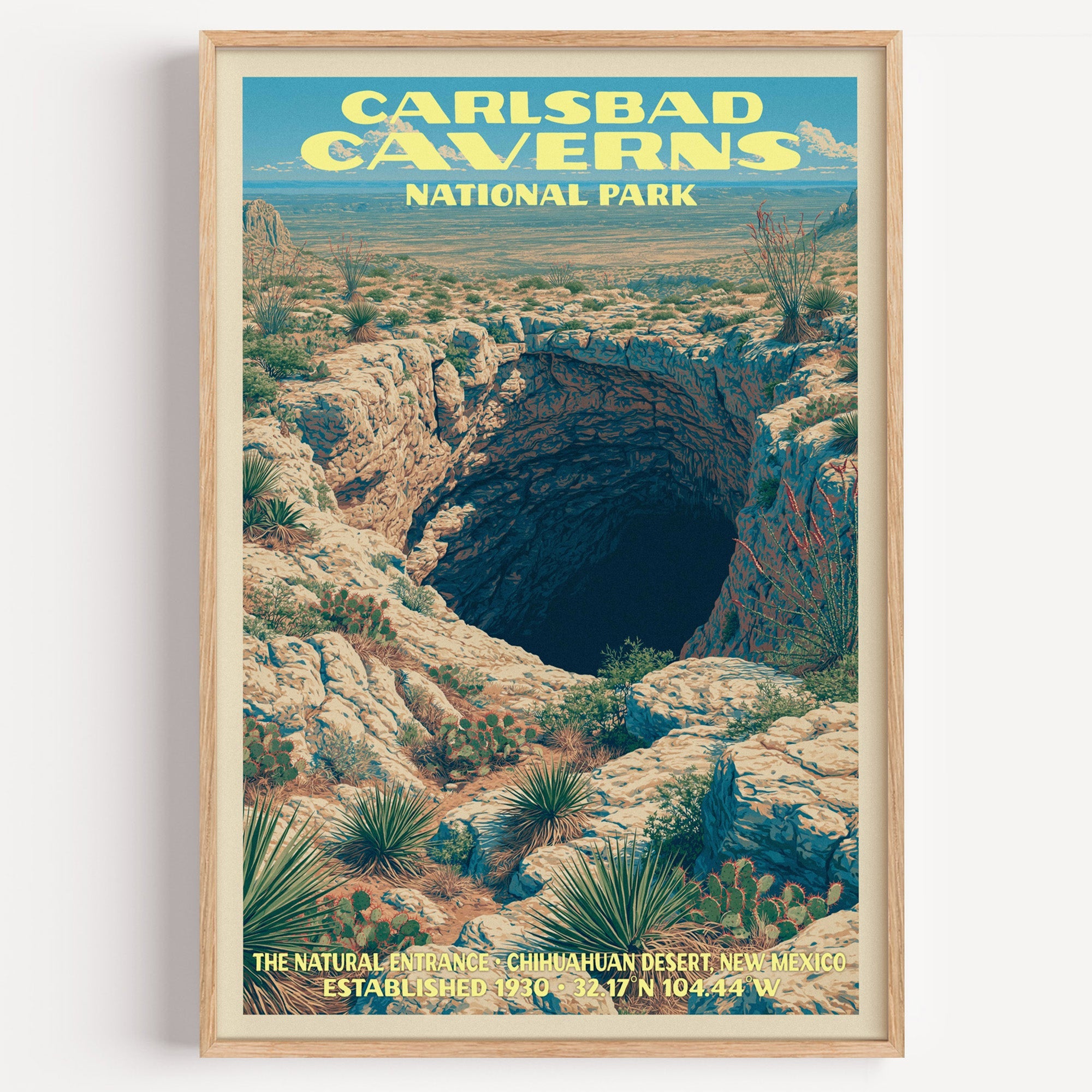 Natural Entrance Carlsbad Caverns vintage poster in a light oak frame on a plain white wall