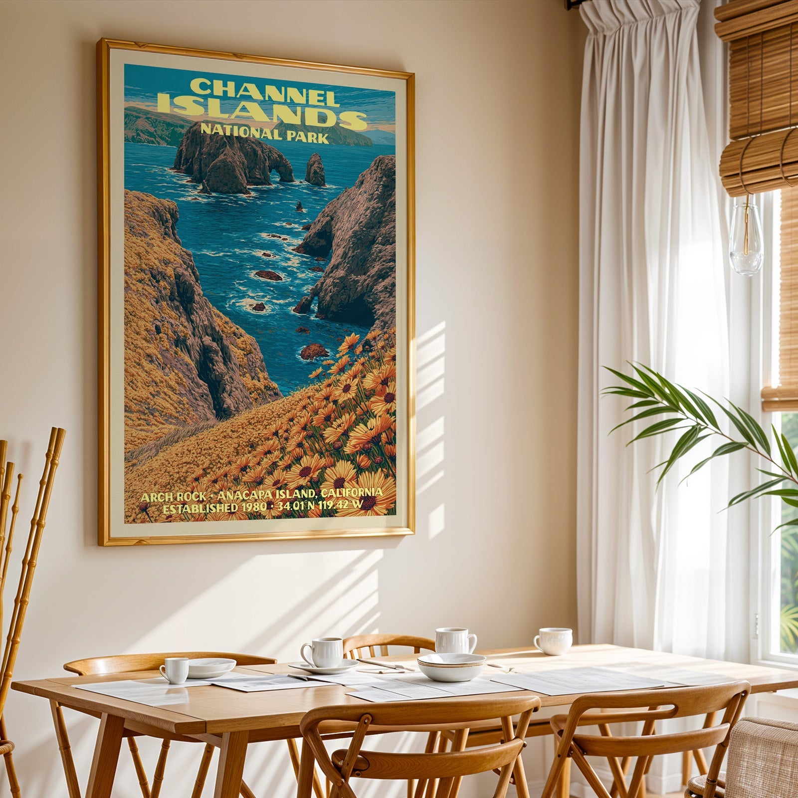 Channel Islands National Park print in gold above a light oak dining table by a curtained window