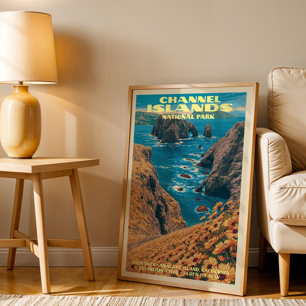 Channel Islands Arch Rock wall art in oak, leaning by an armchair and a side table with an ochre lamp