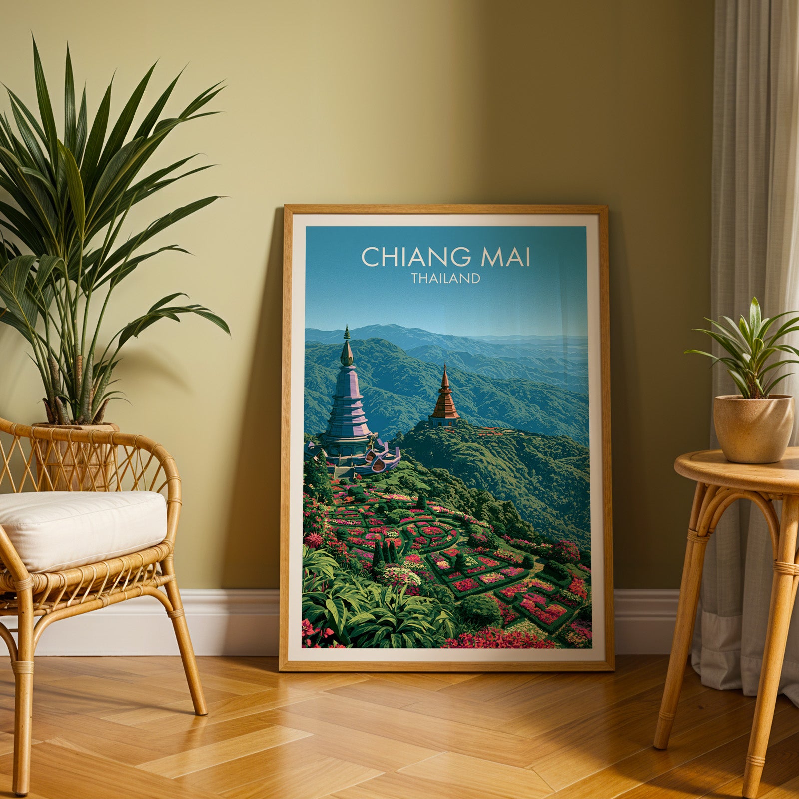 Large Chiang Mai Thailand travel print in an oak frame leaning on a herringbone floor next to a rattan chair