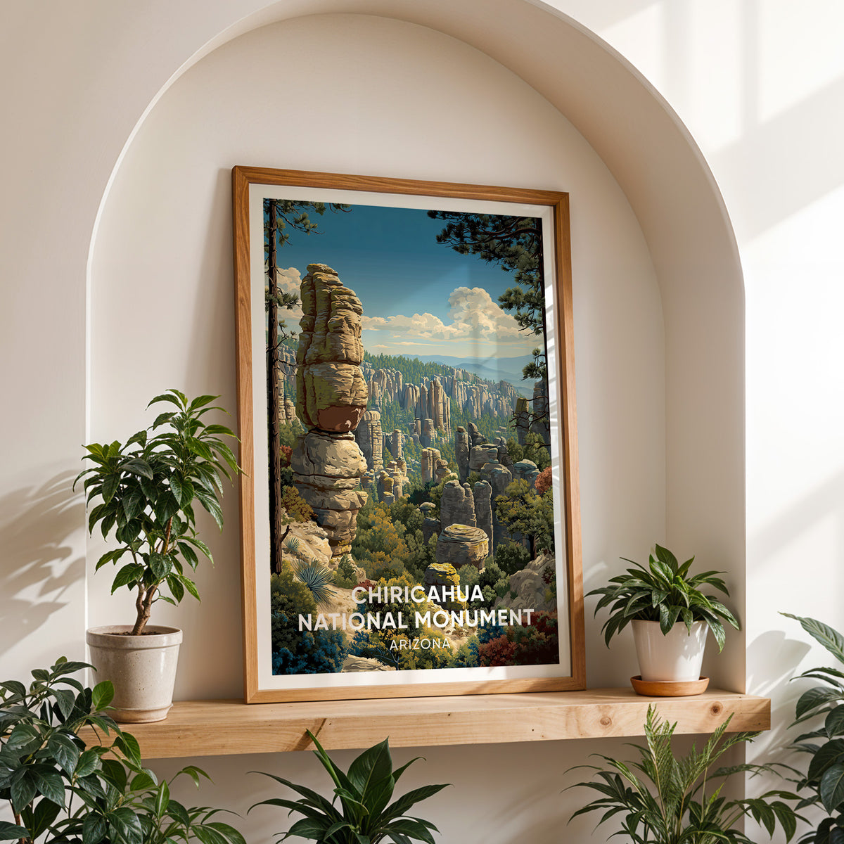 Chiricahua poster on a wood shelf inside a white arched alcove with plants on either side