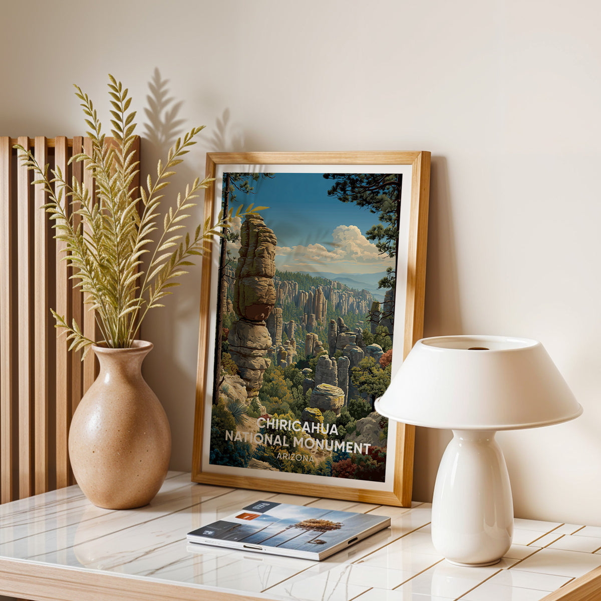 Rhyolite pinnacle print in oak on a stone desk with a white lamp, dried stems and magazines
