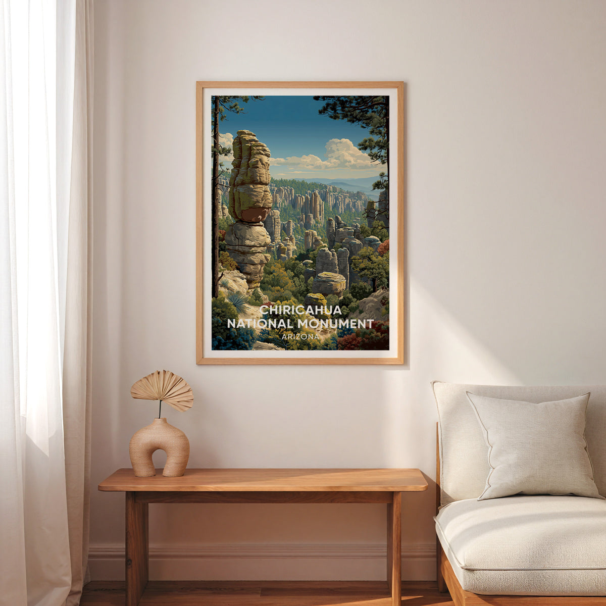 Chiricahua travel art above a slender wooden bench with sheer drapes and a woven palm fan