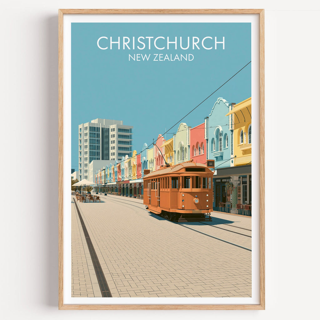 Christchurch tram travel print in a light oak frame on a plain white wall