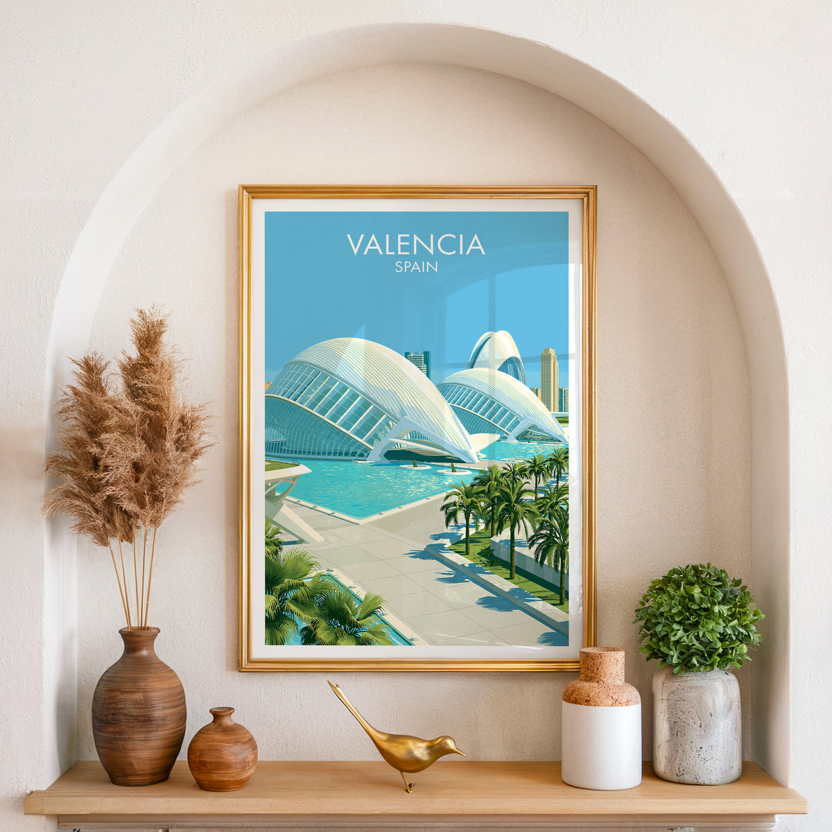 Valencia modern architecture poster, gold frame in an arched wall niche above pampas grass in a clay vase