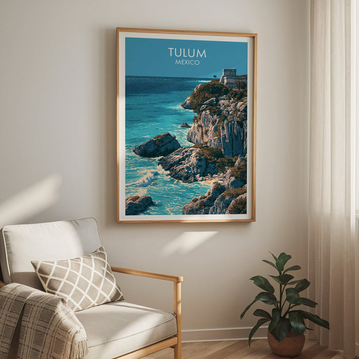 Rocky Caribbean shore print, oak frame over a cream armchair with a check cushion and a sheer curtain.