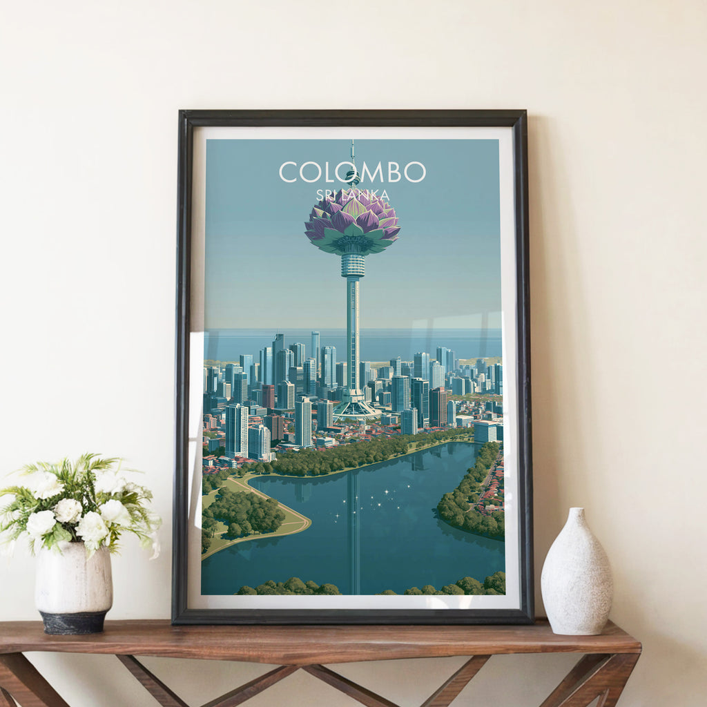 Colombo Sri Lanka travel poster in a black frame on a wooden console table with white flowers
