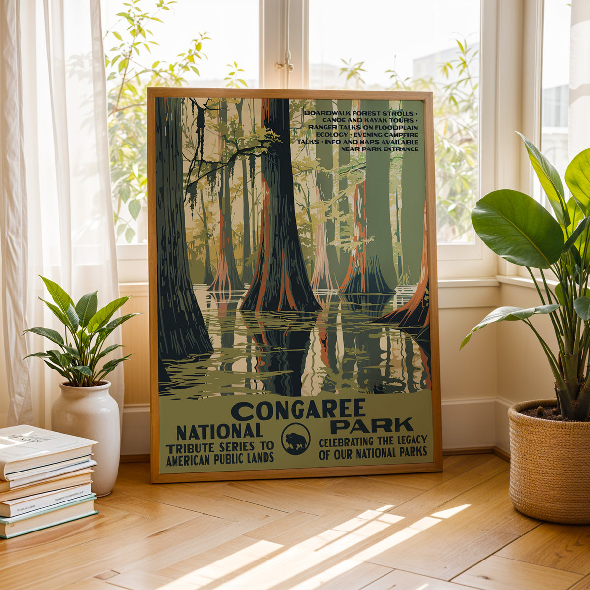 Congaree National Park vintage print by a bright window with houseplants and books